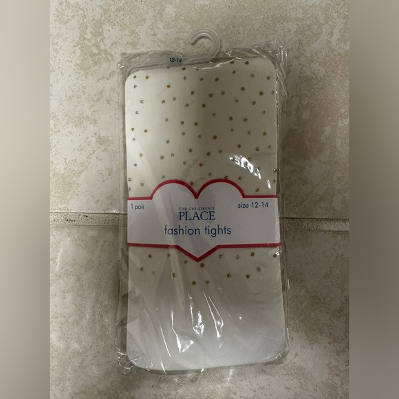 The Children’s Place Girls white polka dot fashion tights side 12-14 - Picture 1 of 2